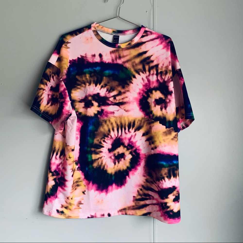 Pink tie dye over sized shirt. Can fit small to large